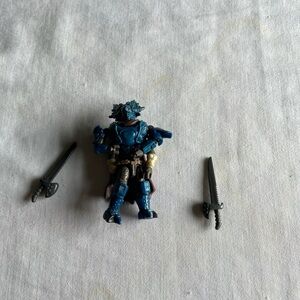 Mega Bloks Blue Armored Warrior Action Figure with Two Gray Swords